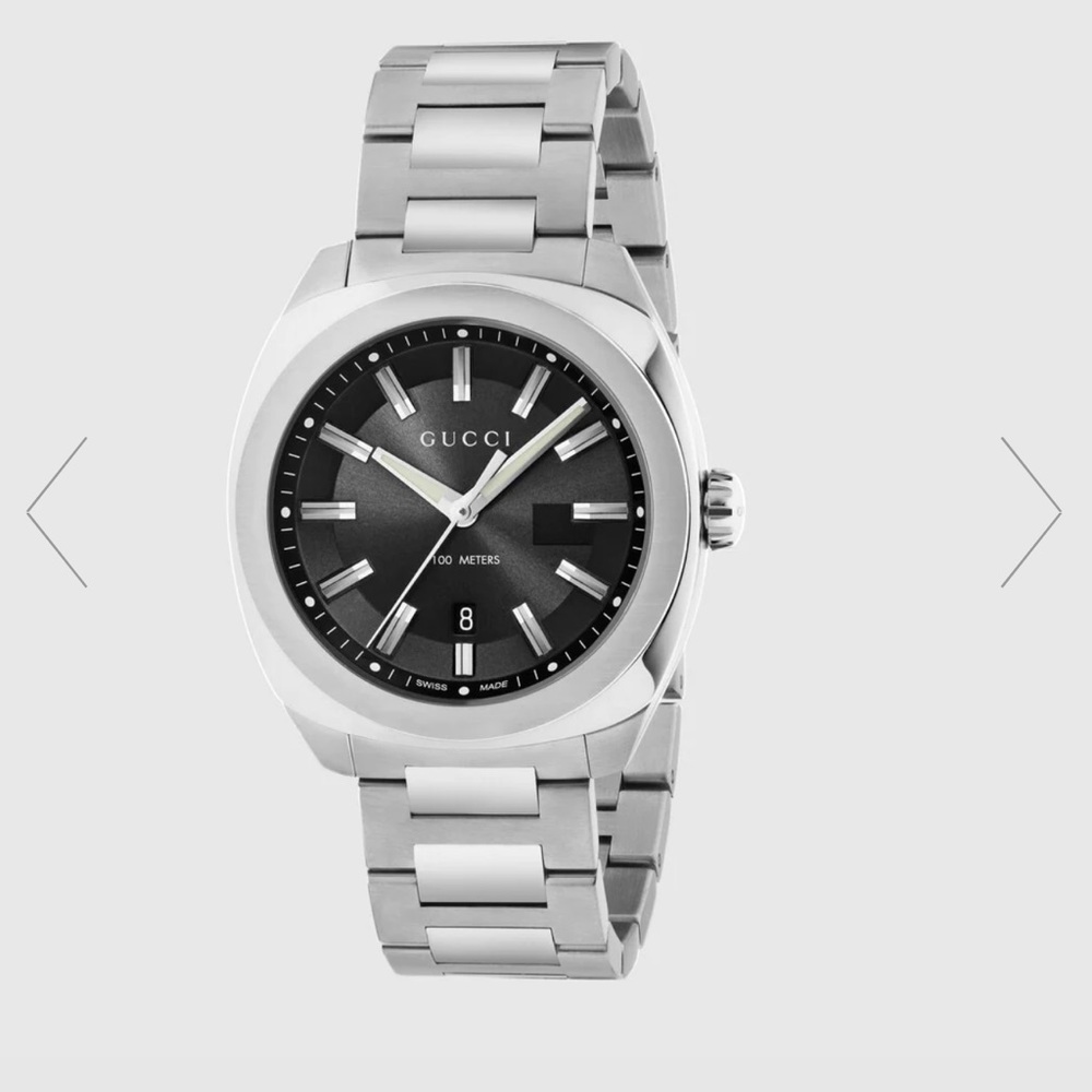 Brand new Gucci watch in box . Original with tags . Only worn once.Retail 1300